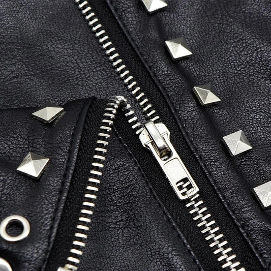A black leather jacket designed for cats, featuring a sleek and stylish look to elevate your feline's fashion sense.