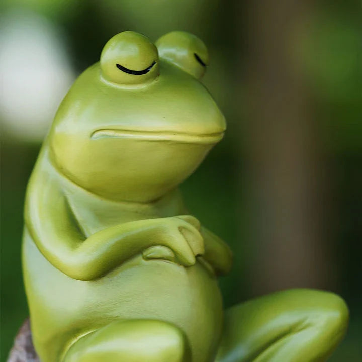 Charming resin figurine of a thoughtful, contemplative frog in a realistic pose, perfect for home or garden decor