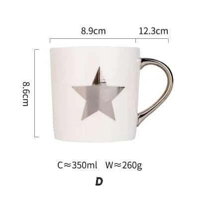 Elegant porcelain coffee mug with a lustrous gold heart design, perfect for enjoying hot beverages in style.