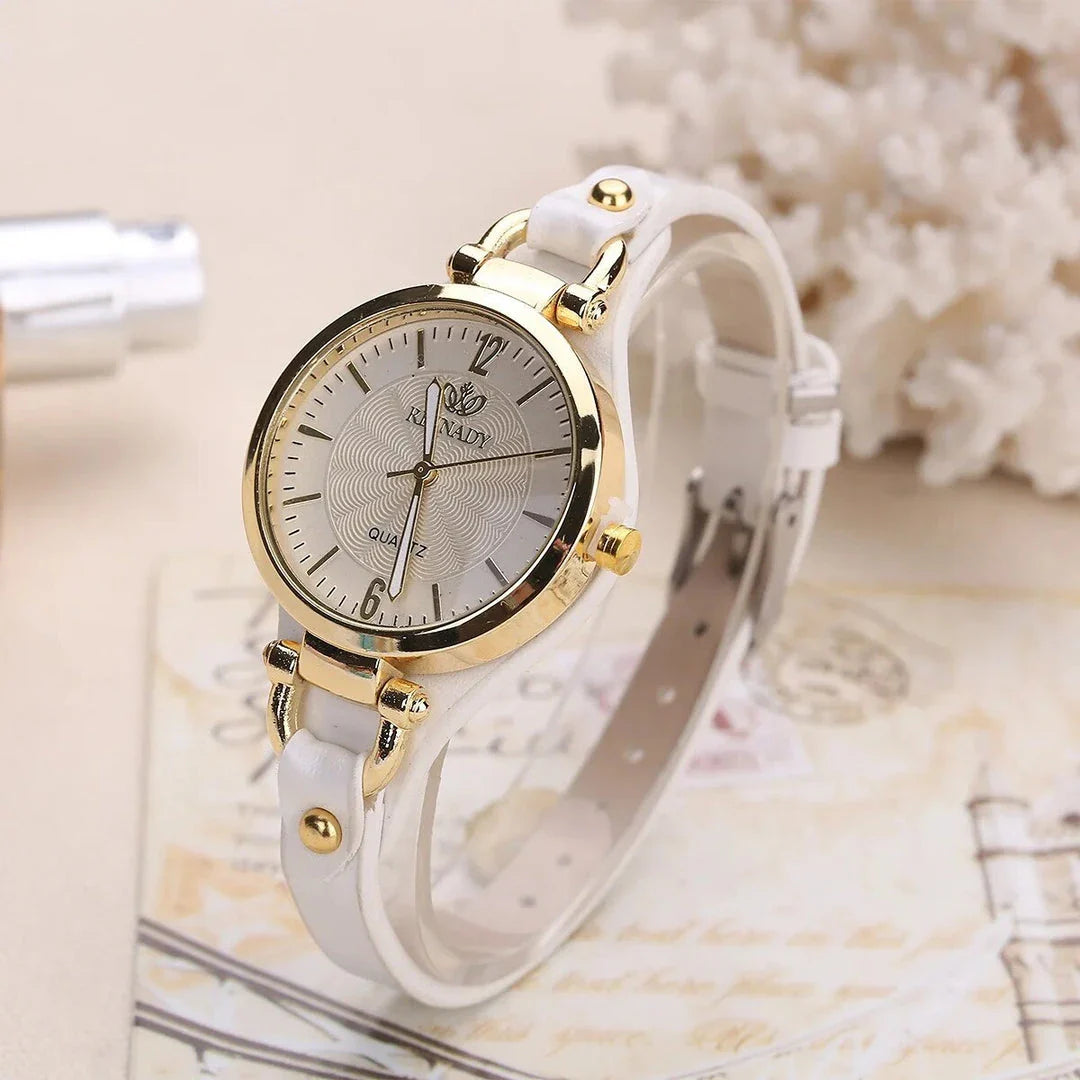 Elegant women's quartz watch with a black leather strap, featuring a sleek alloy case and a durable glass dial window