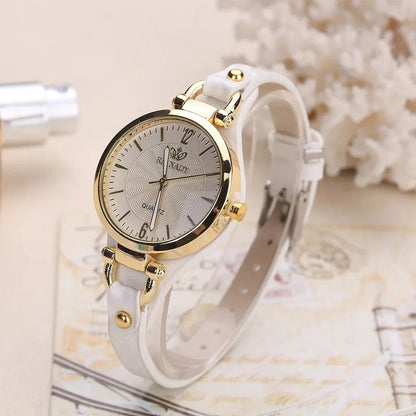 Elegant women's quartz watch with a black leather strap, featuring a sleek alloy case and a durable glass dial window