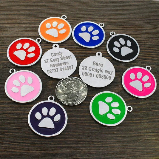 Customisable stainless steel pet ID tags in various colours, designed for identifying and protecting your beloved companion