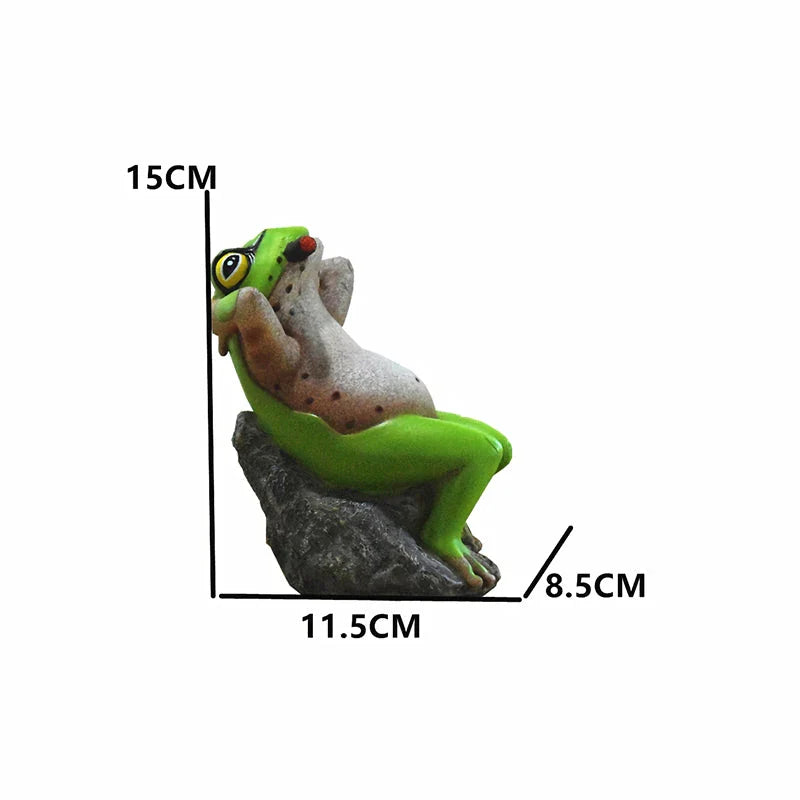 Charming frog garden figurines in various mischievous poses, adding a playful touch to outdoor decor