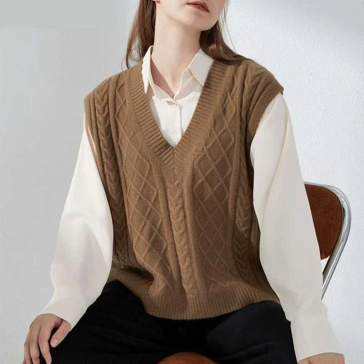Cosy oversized knitted vest in various colours, featuring a sleeveless V-neck design for versatile layering