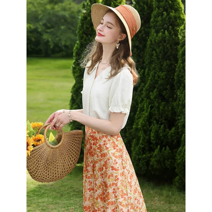 Elegant apricot French-inspired lace blouse with puff sleeves and v-neck collar, perfect for the modern British woman