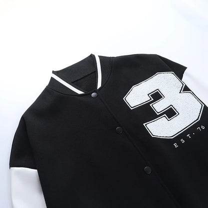 A classic British-style baseball jacket with contrast PU stitching, showcasing a sophisticated and versatile design for casual wear.
