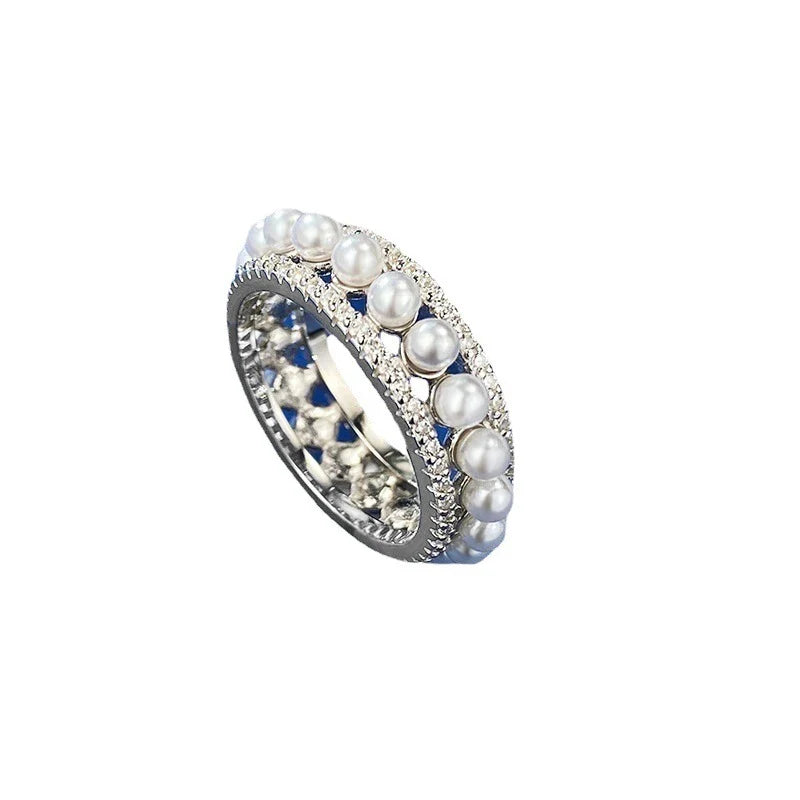 A beautiful 925 sterling silver ring with a delicate pearl accent, designed for the discerning British woman