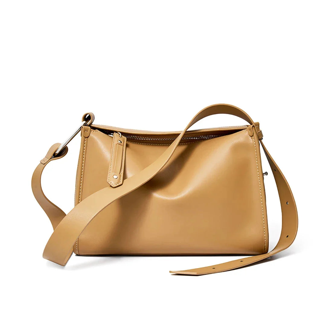 Genuine leather shoulder bag with soft, pillow-like shape and secure zipper closure