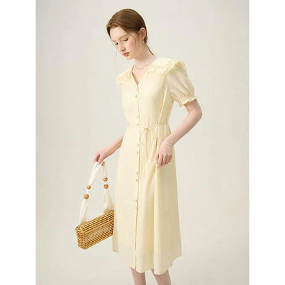 Elegant navy blue sailor collar dress with delicate fungus-edged sleeves, versatile and stylish for summer events