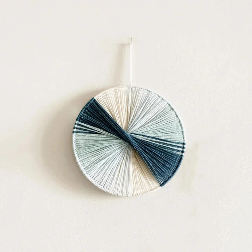 Colourful handcrafted macrame wall hanging made with premium cotton threads, adding bohemian charm to any room
