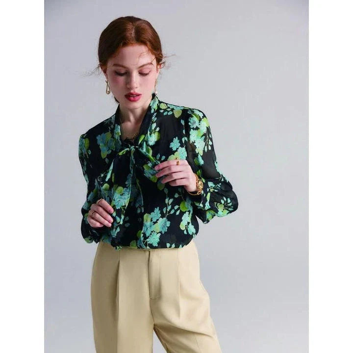 Elegant floral silk blend blouse for women featuring a bow collar, puff sleeves, and a flattering straight-cut silhouette