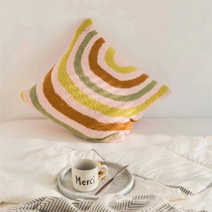 Bohemian-inspired microfibre cushion cover in light pink and white with a cosy, fuzzy texture