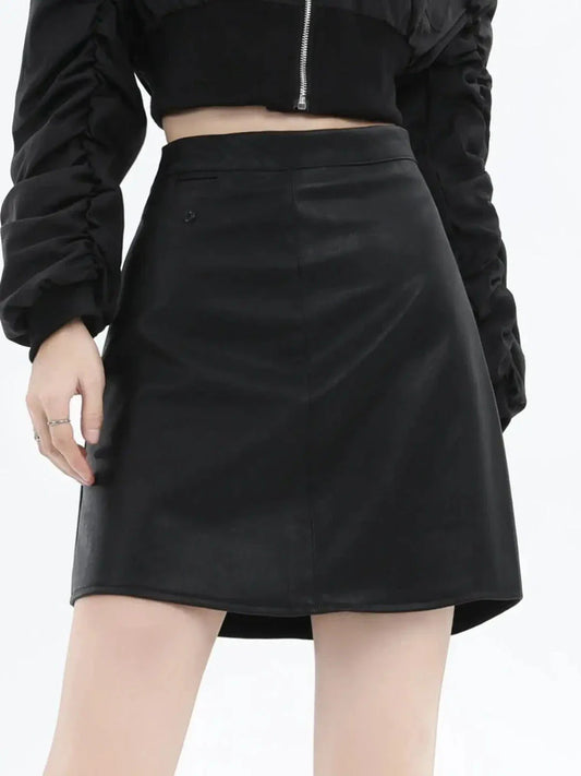 A chic faux leather high-waisted mini skirt in black, perfect for the modern British woman's autumn and winter wardrobe.