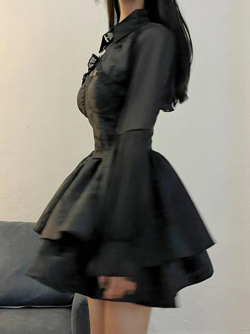 A stylish and elegant women's pettiskirt in a classic black colour, featuring a flowing A-line silhouette and premium polyester construction.