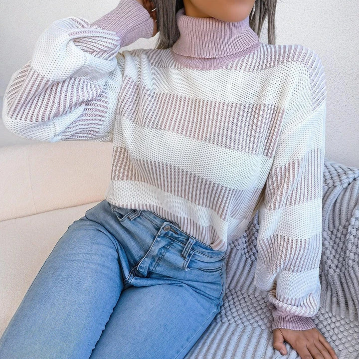 Cosy and stylish high-neck striped sweater in various colours, featuring lantern sleeves and a relaxed fit for all-day comfort.