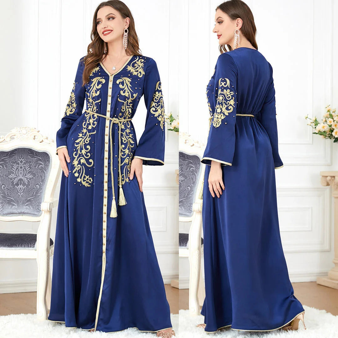 A sophisticated long-sleeve women's dress with a captivating floral embroidery pattern and a refined colour palette, suitable for a variety of occasions.