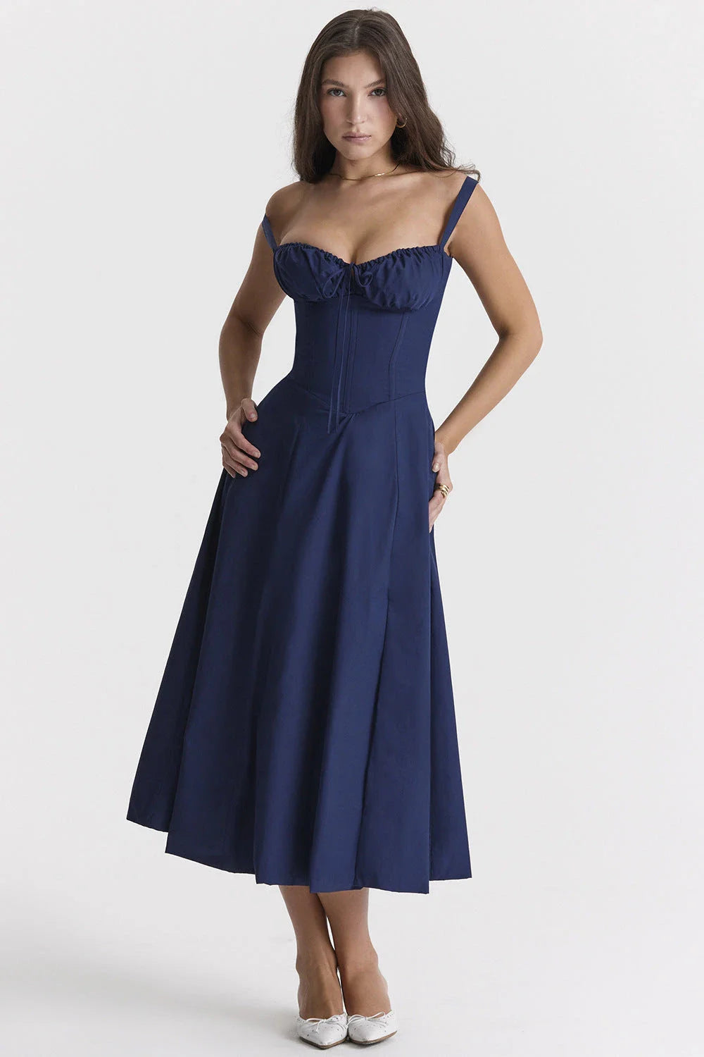 A stylish suspender dress made of premium polyester with a French high-split design, available in a range of vibrant solid colours for versatile summer wear.