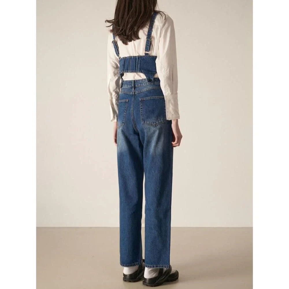 Chic denim two-piece set with sleeveless top and relaxed fit trousers in a stylish and comfortable design