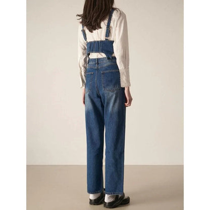 Chic denim two-piece set with sleeveless top and relaxed fit trousers in a stylish and comfortable design