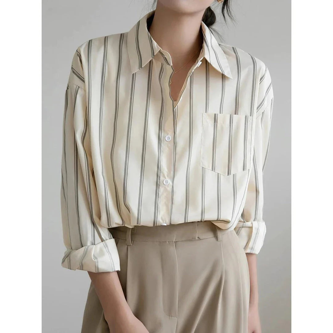 Elegant striped office blouse with chic drop shoulder design, made from premium polyester-cotton blend for durability and comfort