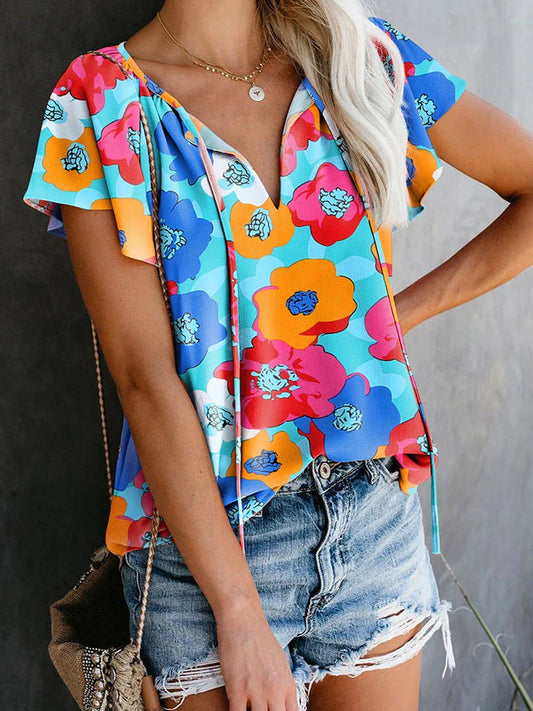 Elegant floral print drawstring v-neck short sleeve top in a pastoral, feminine style
