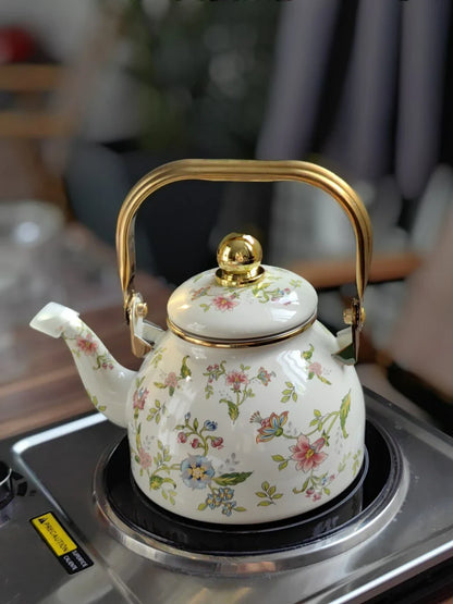 Elegant enamel outdoor kettle with a 1200 ml capacity, designed for brewing tea in style