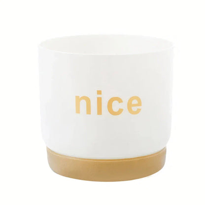 Elegant self-watering planters in various sizes, perfect for indoor plants and home or office decor