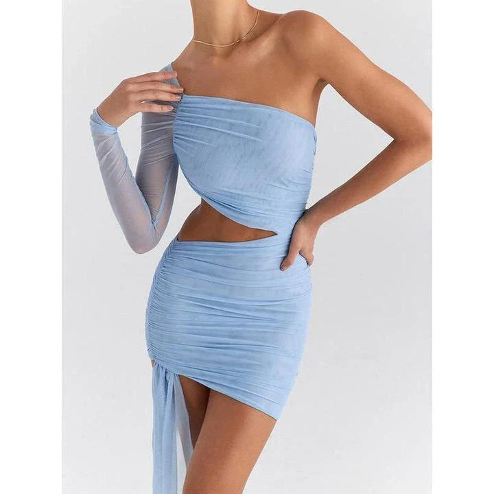 Elegant backless mini dress with sheer mesh overlay, perfect for spring and summer events in the UK
