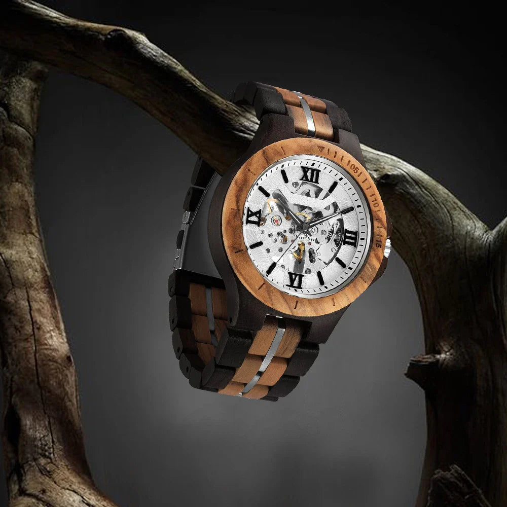 Elegant mechanical watch with wood strap, stainless steel buckle, and pointer display, showcasing British craftsmanship and precision timekeeping.