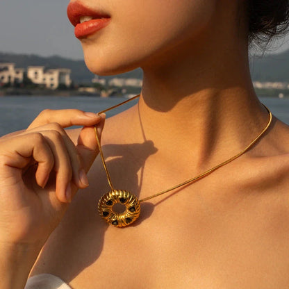 Elegant 18K gold plated minimalist jewellery set with O-shaped earrings and necklace, crafted from durable stainless steel for timeless style.