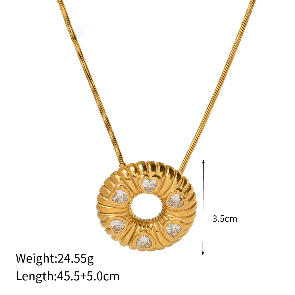 Elegant 18K gold plated minimalist jewellery set with O-shaped earrings and necklace, crafted from durable stainless steel for timeless style.