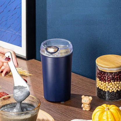Compact electric coffee grinder with stainless steel blades for fast and even grinding of coffee beans, nuts, seeds, and spices