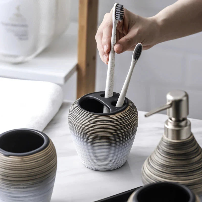 Elegant retro ceramic bathroom accessories set with toothbrush holder, soap dispenser, and mouthwash cup