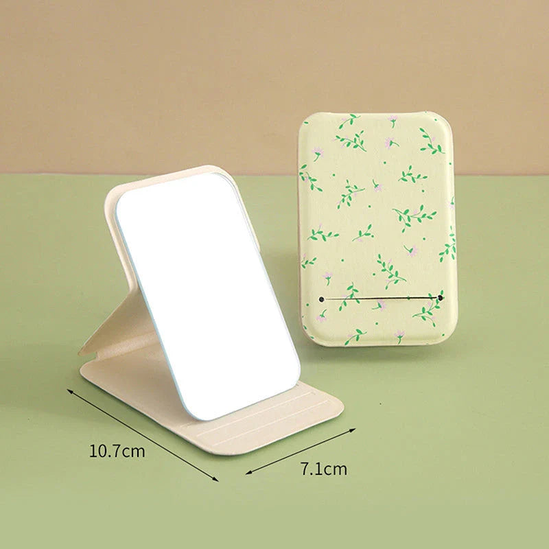 Elegant floral folding makeup mirror with a unique design and clear, distortion-free reflection