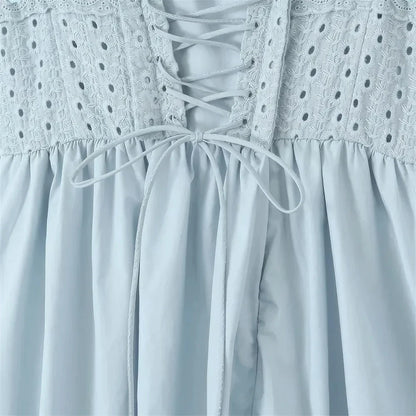 Blue midi crochet dress with spaghetti straps, bustier design, and floral crochet pattern
