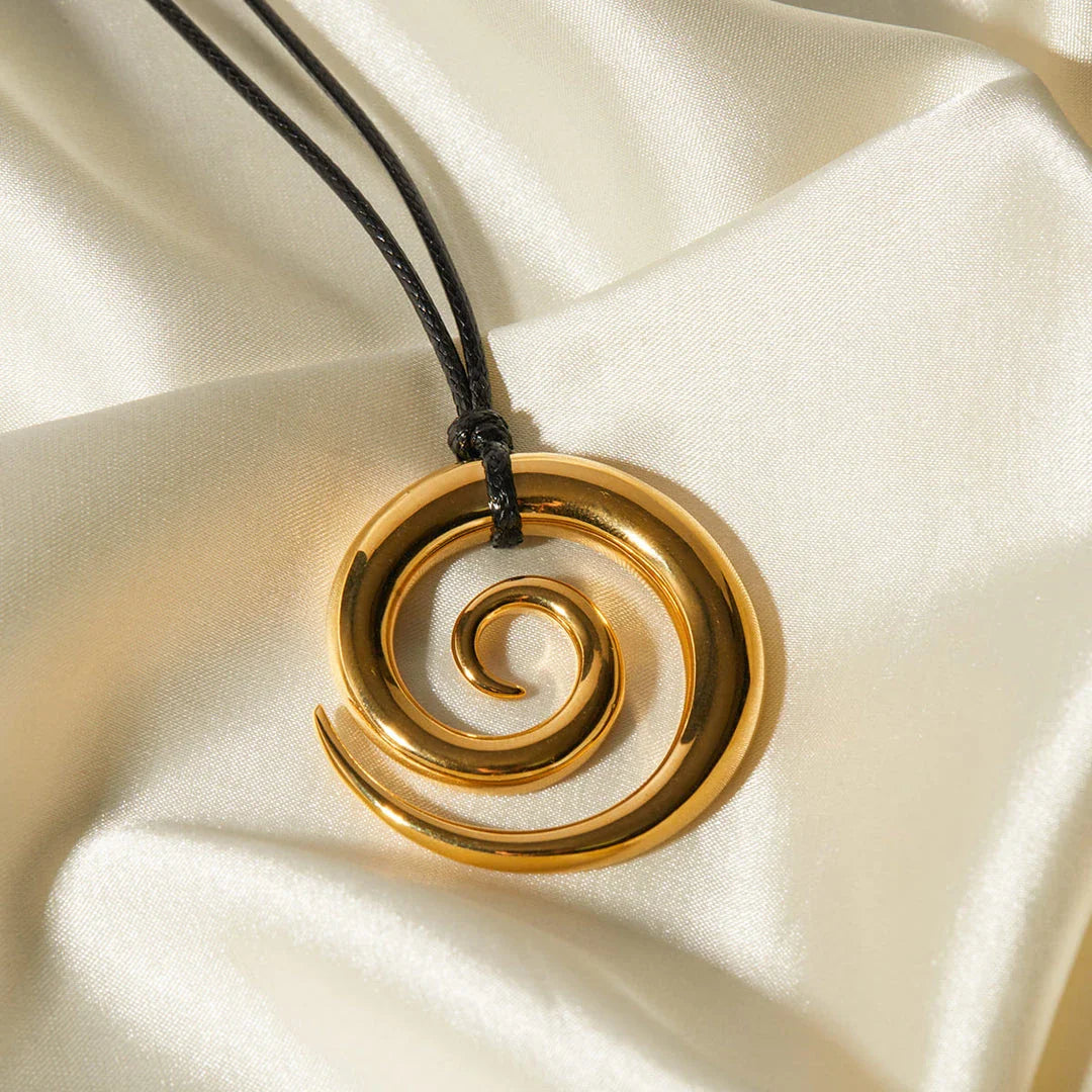 Elegant 18K gold-plated spiral circle pendant necklace made of premium stainless steel with a timeless design