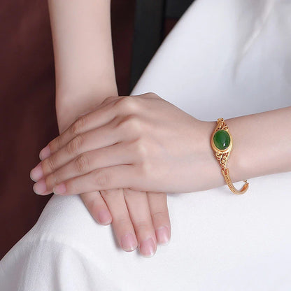 Pure silver bracelet with gilded jasper auspicious cloud design, inspired by traditional Chinese style