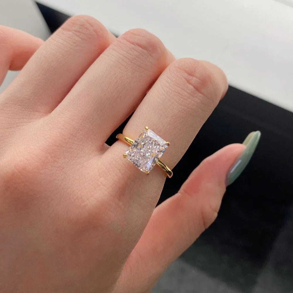 Elegant 4-Claw S925 Sterling Silver Zircon Ring with a quadrilateral setting and radiant zircon centre stone