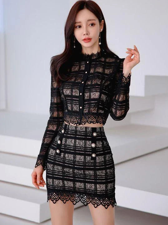 Elegant lace-trimmed two-piece suit with Chanel-inspired design and tailored stitching details