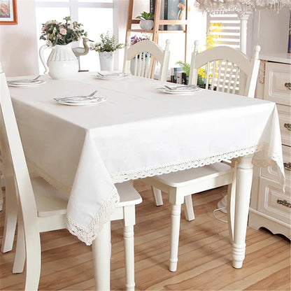 Elegant polyester linen tablecloth with delicate lace edging, available in various sizes for a sophisticated dining experience.
