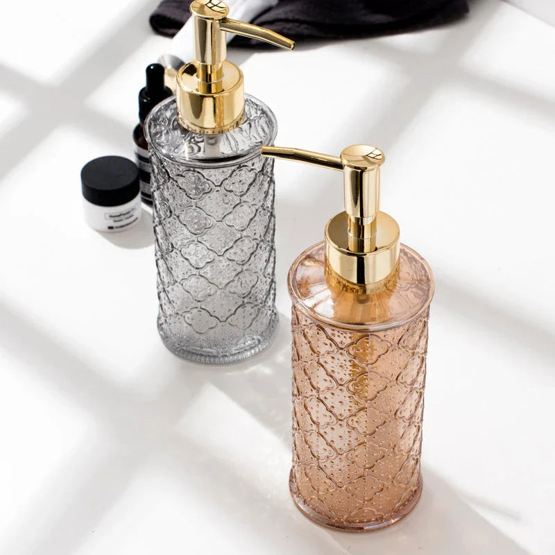 Elegant glass soap dispenser with sleek, minimalist design for bathroom and kitchen use