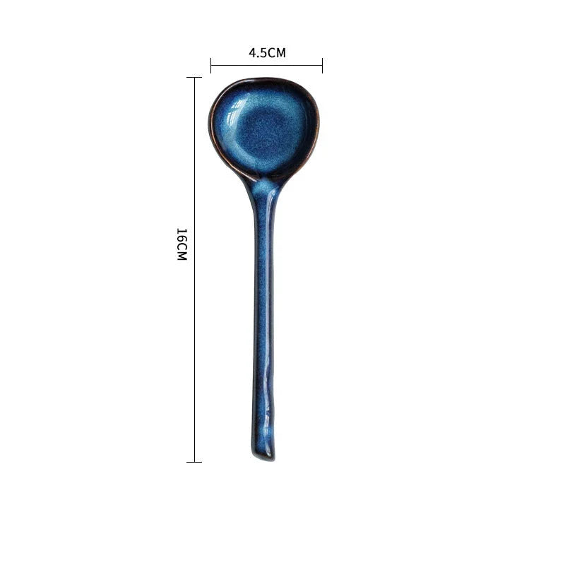 Elegant British ceramic soup spoon with long handle and vibrant glaze for refined dining experience