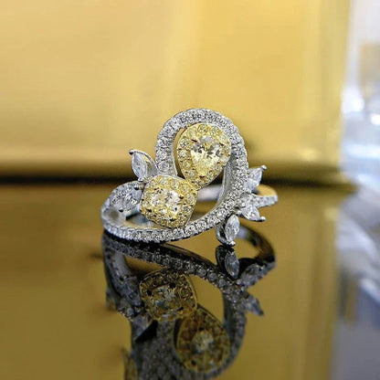Elegant 925 silver ring with a yellow diamond, a timeless British accessory