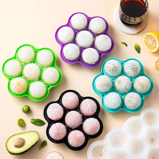 Spherical silicone ice mould with seven holes for creating elegant ice spheres to chill premium drinks
