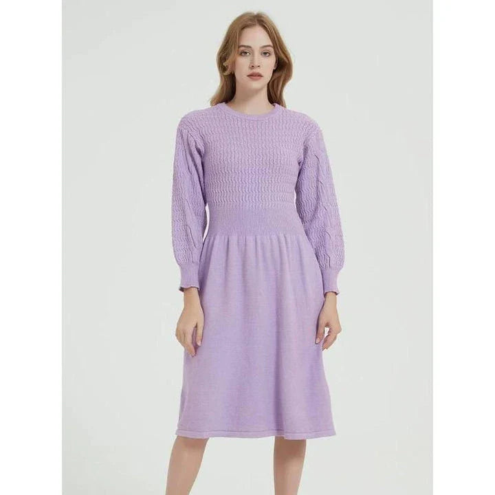 Elegant long sleeve knitted sweater dress in red with a classic A-line silhouette and mid-calf length