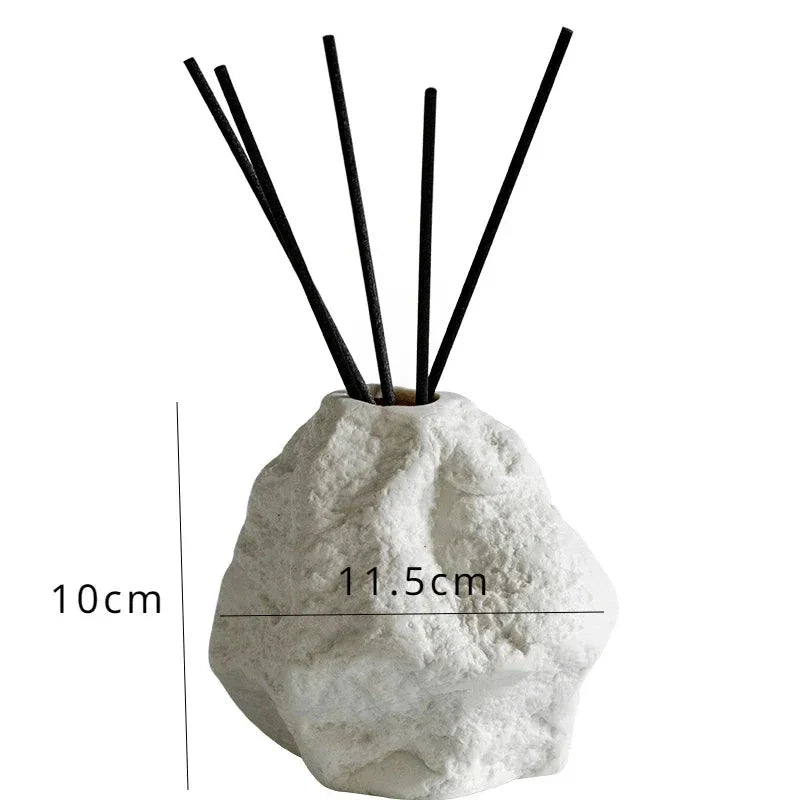 Elegant Nordic-style ceramic aromatherapy diffuser bottle with a modern, rock-inspired design