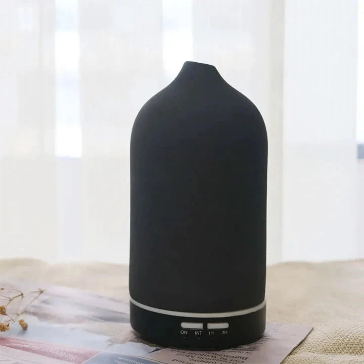 Elegant ceramic ultrasonic essential oil diffuser with timer and night light function for home ambiance and aromatherapy