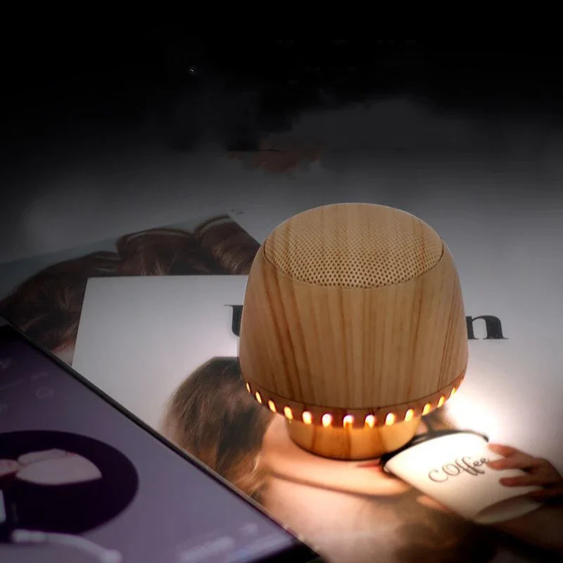 Compact wireless Bluetooth speaker with mushroom-inspired bionic design and night light function