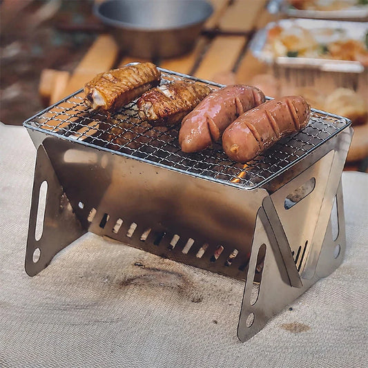 Compact stainless steel portable folding BBQ grill for outdoor cooking and camping