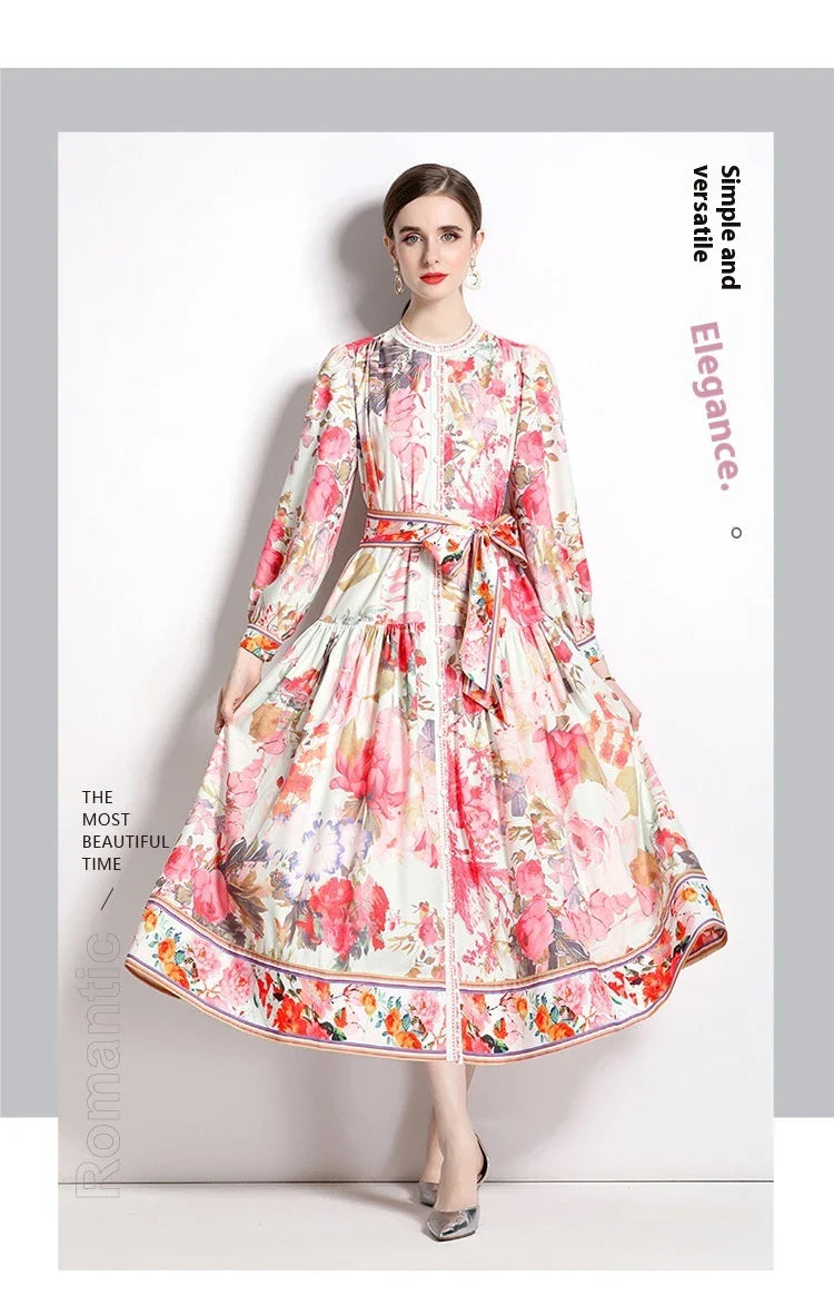 Elegant floral single-breasted swing dress with delicate print, tailored design, and flowing silhouette